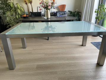 Eettafel afm 2 x1 m. met glasplaat  Frame rvs demontabel