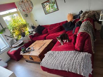 Grote rode hoekbank met los deel