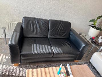 bankstel  zwart leer. 2 en 2,5 zits. Gratis af te halen