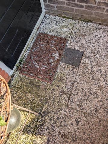 Vintage gietijzeren mat