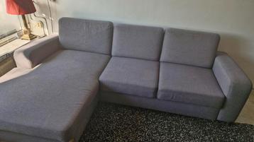 Gratis grijze hoekbank met berging