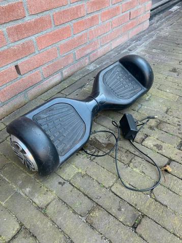 Zwarte hoverboard met oplader