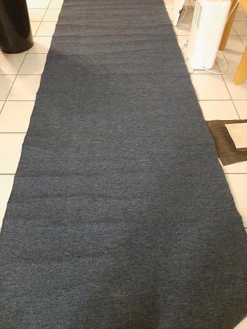 Gratis stuk vloerbedekking.