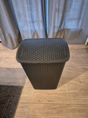 Gratis wasmand met deksel