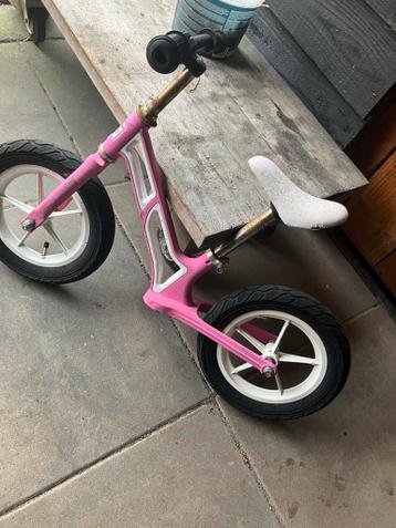 Roze kinderloopfiets