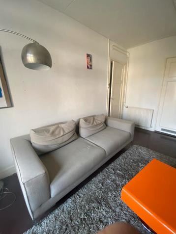 Stijlvolle grijze designer bank 'Design On Stock' van Vos