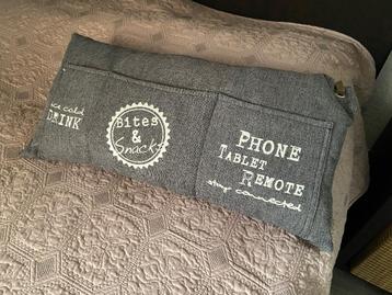 Gratis opbergkussen voor telefoon en afstandsbediening