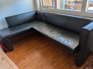 Gratis: Zwart leren eetkamerbank zit nog perfect