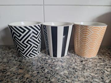 3 koffiemokjes met verschillende patronen