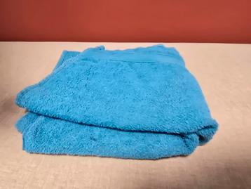 Mooie blauwe handdoek - Gratis i.v.m. Textiel Race