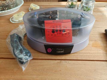 GRATIS (voor 1 reep chocolade) Carmen krulset.