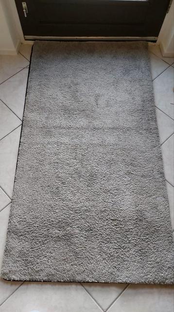 Gratis grijs vloerkleed van 150CMx80CM