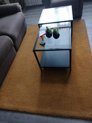 2 okergele vloerkleden gratis !