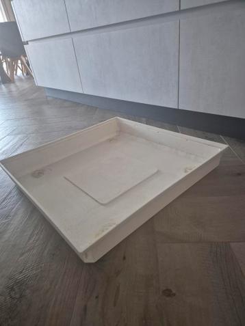 Gratis opvangbak voor wasmachine