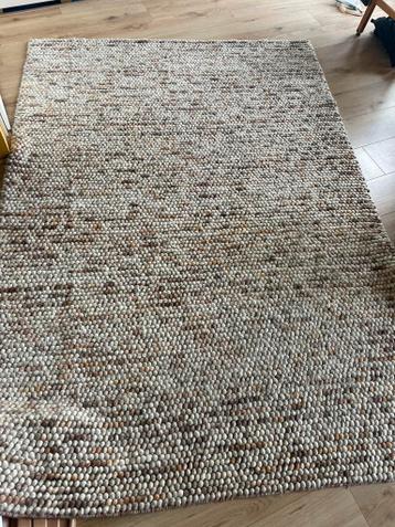 Wollen bolletjes vloerkleed