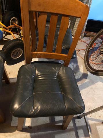 Set van 4 houten eetkamerstoelen met leren zitting