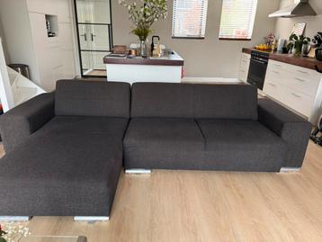 Bruin/grijze hoekbank ook als twee delen neer te zetten