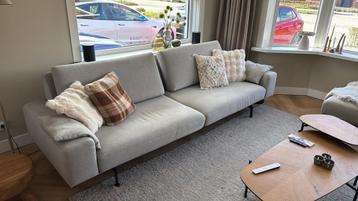 Grijze bank 278cm plus hocker