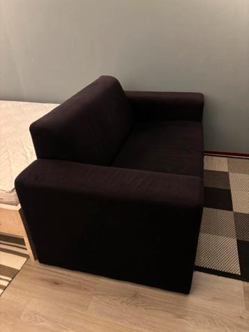 Gratis: kleine zwarte tweezitsbank 1.50