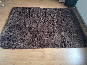 Gratis ophalen bruine  hoogpolig kleed