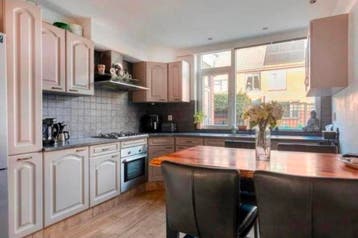 GRATIS - Complete L-keuken 280 x 310 cm - met merk apparaten