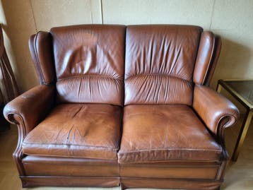 gratis 1 leren bank met 2 leren stoelen fauteuil Oosterhout