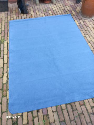 Vloerkleed blauw 220 x 165 cm.
