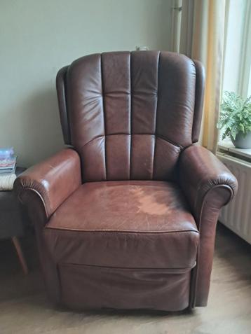 Bruine leren fauteuil, comfortabel en gebruikt