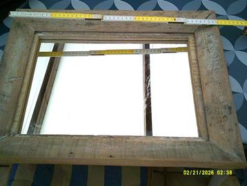 Spiegel met ruw houten kader.50../40