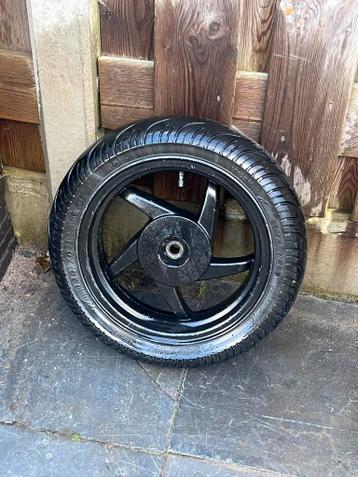 Gratis Sym fiddle wiel.