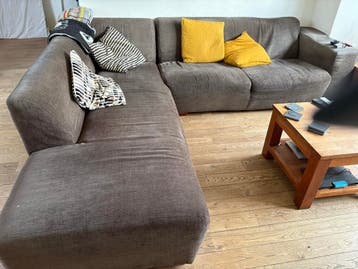 Grote donkerbruine hoekbank