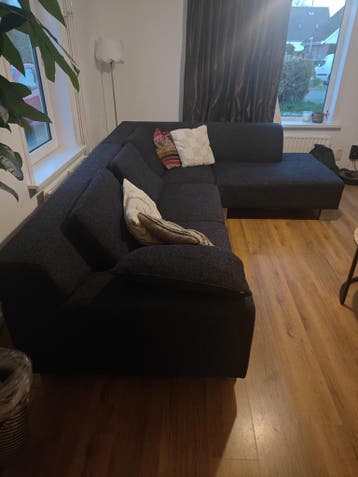 Donkergrijze hoekbank met chaise longue