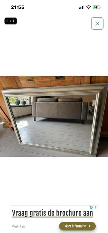 Grote spiegel met zilverkleurige lijst