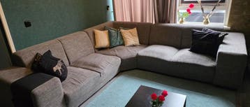 Moet weg!!Comfortabele lounge hoekbank - grijsbruin