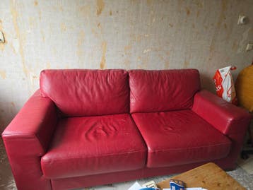 Rode leren bankstel met kattenkrassen - 194x95 cm