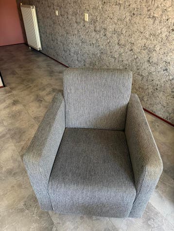 Grijze fauteuil
