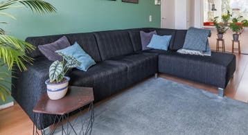 Gratis! Grote zwarte hoekbank