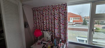 Verduisterende gordijnen met bloemenprint