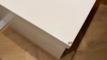 Witte tv-meubel met lades en wieltjes