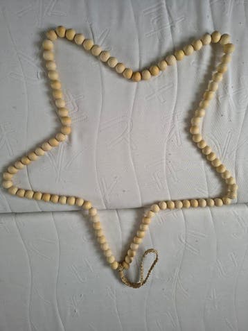 Houten ster voor aan de muur