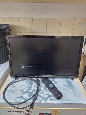 gratisPhilips TV 24 inch met afstandsbediening en HDMI kabel