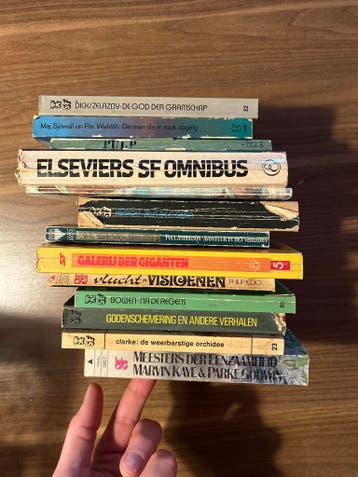 Stapeltje SF boeken, o.a. Philip K. Dick, Zelazny
