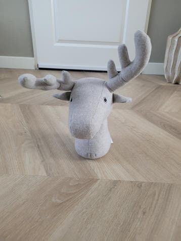 Rendier deurstopper van beige stof