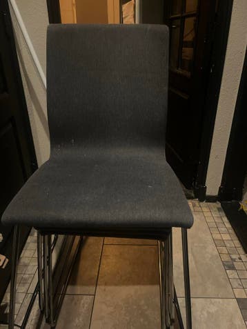 4 antraciet stoelen met zilveren poten