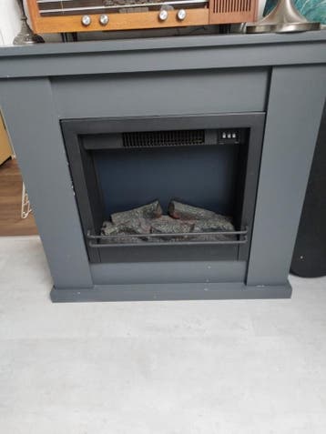 Gratis elektrische haard met houtblokken