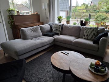 Comfortabele grijze hoekbank - Ruim en modern