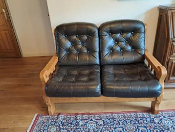 leren 2-sit bank en een fauteuil