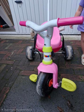 Smoby driewieler met duwstang