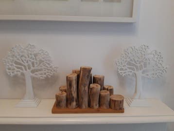 Decoratieve takkenstandaard (handgemaakt) gratis bij lamp