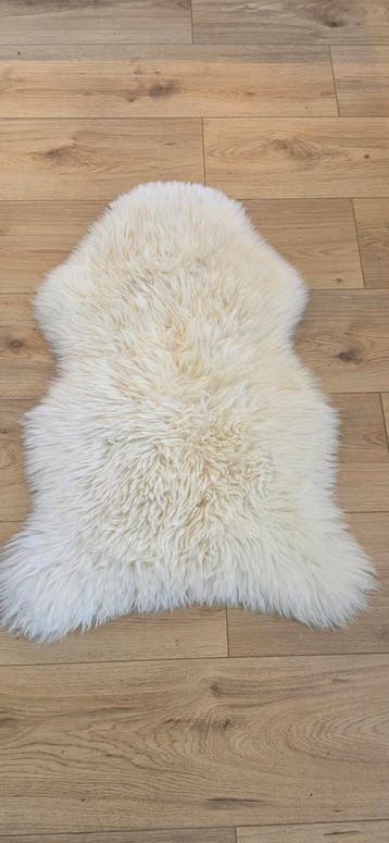 Wit schapenvacht kleedje